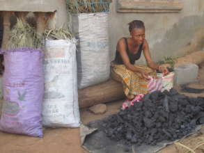 young lady retailing coal