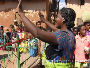Celebrating the new fence for the communal water faucet