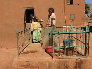 Communal water faucet with new fence (2011)