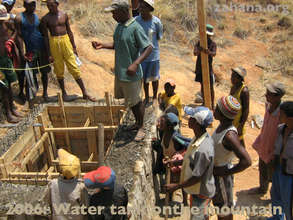 Building the water tank way up on the mountain