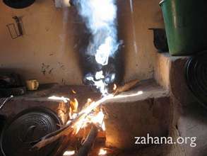 Open fire cookstove in the village with rice pot