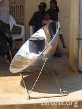 Parabolic solar cooker in use iMadagascar