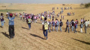 Children walking to school in the Naqab desert