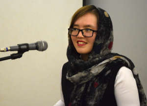 Farishta, speaking on a panel at her university