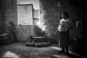 Nahua partner and her children in her home