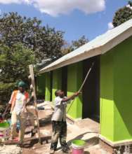 The builder hard at work painting.