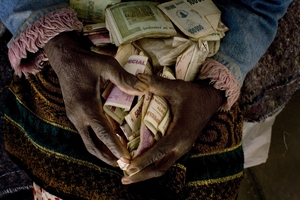 Anna's life savings of Zimbabwean dollars that are now worthless