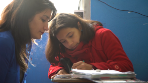 A tutor accompanies the children every day