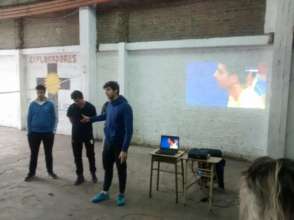 Professional volley players encouraging the kids