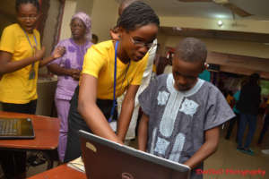 Camp alumnae exhibiting her project
