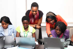 Girls learning to programme