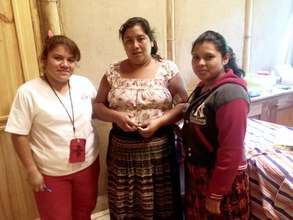 Nurse Claudia with patients, San Pablo