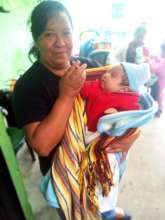 Etelvina babysitting while a patient gets screened