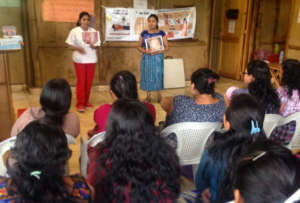 Rosy giving a talk about cervical cancer