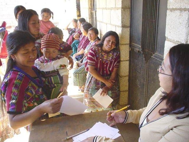 Women lined up at a mobile clinic