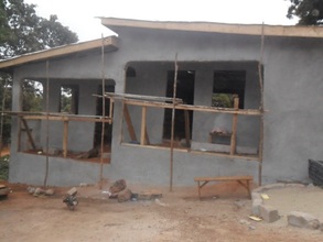 Plastering and roofing of building