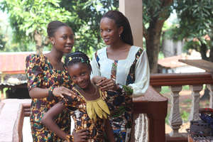 Models in Dresses and Handbags Produced
