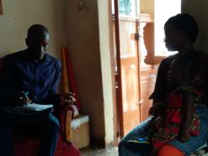 Joseph, Program Officer Talking to Zainab