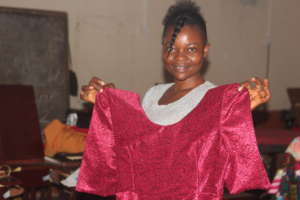 Trainee shows completed dress