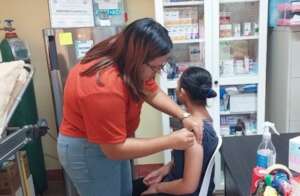 Flu vaccination administration.
