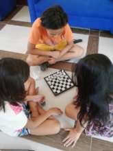CAMELEON girls playing chess