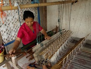 A Laos women weaver hard at work