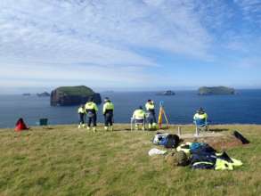 Volunteers conducting land observations