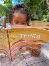 Reading under the palm trees