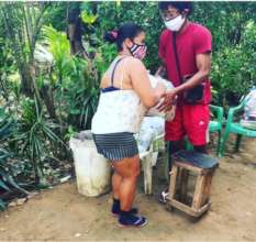 Young people distribute COVID support baskets