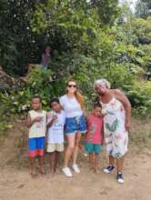 Picking cashew fruit in the woods