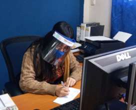 Deysi Working with her PPE in Place