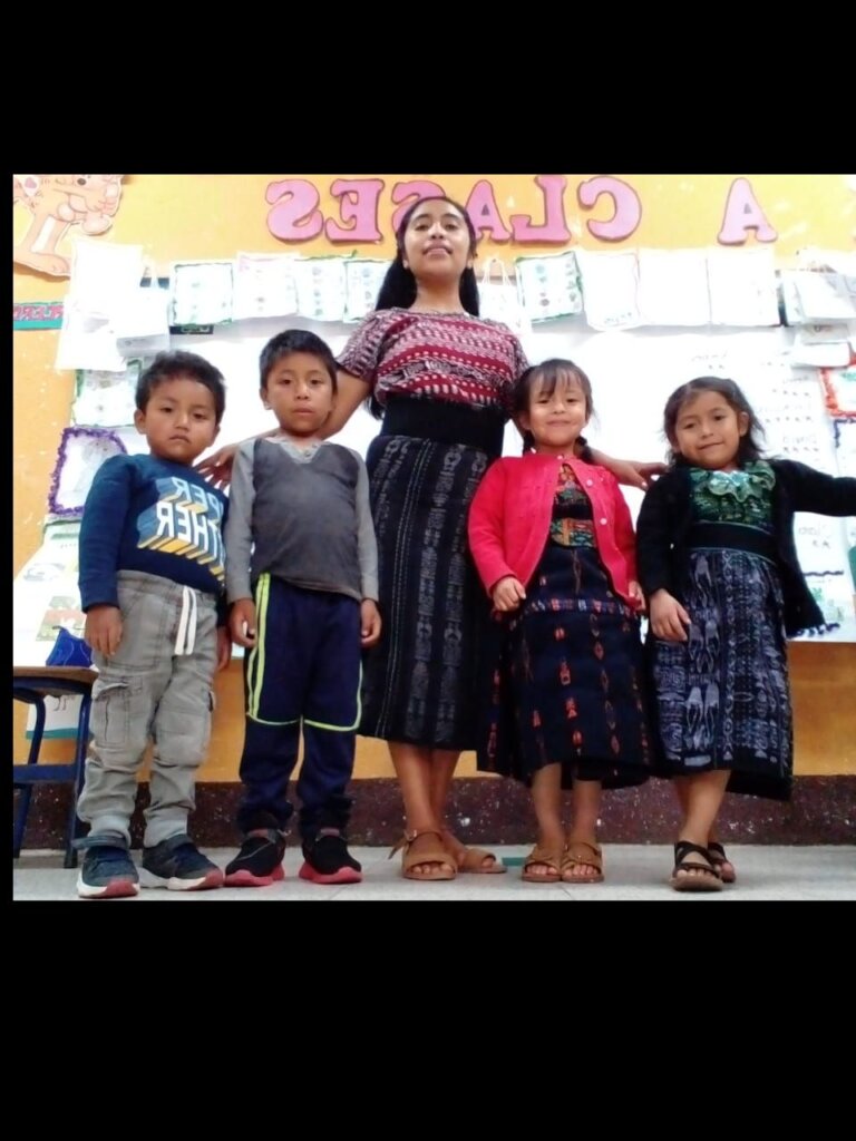 Juana Rosalia with her students.