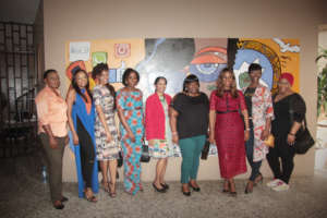 Celebrities unveiling the finished mural work.