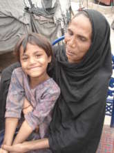 Samina and her daughter giving interview