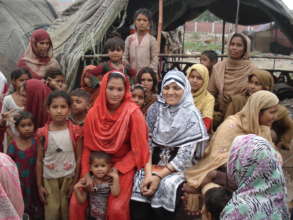 Zareen Chairperson with homeless women & children