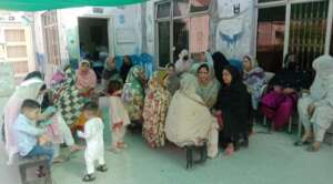 families waiting for dry ration in branch office
