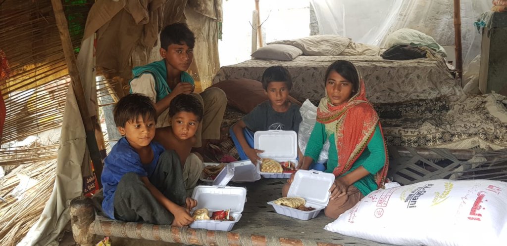 whole family including children eat meat