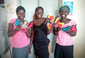 Teen mums showing off their products
