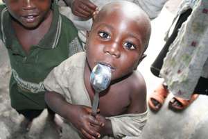 Congolese boy at IMC's nutrition clinic