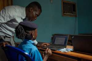 Mr Jiya assisting the girls.