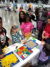 Naomi and Mum DR Kolo at the Science Expo.