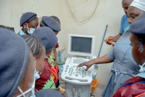 The girls being introduced to more equipment.