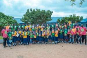 Group picture of the girls, both staff.