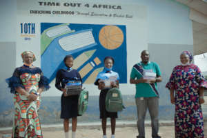 Timeout4Africa mural as a background with our team