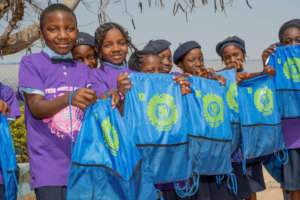 Our girls showing off there bags with gifts