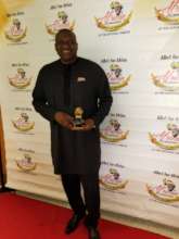 Mr Jonathan Kolo with his award.