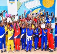 Over 30 students receive shoes at Mawo School.