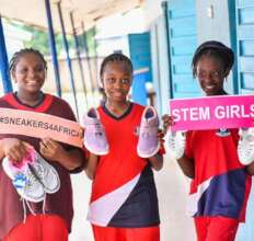 Our STEM girls receive shoes from Sneakers4Africa