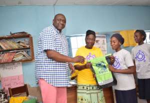 Gift bag presentation with Mr Kolo and principal.