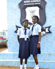 Favour in 2018 with here friend at Mayo school.